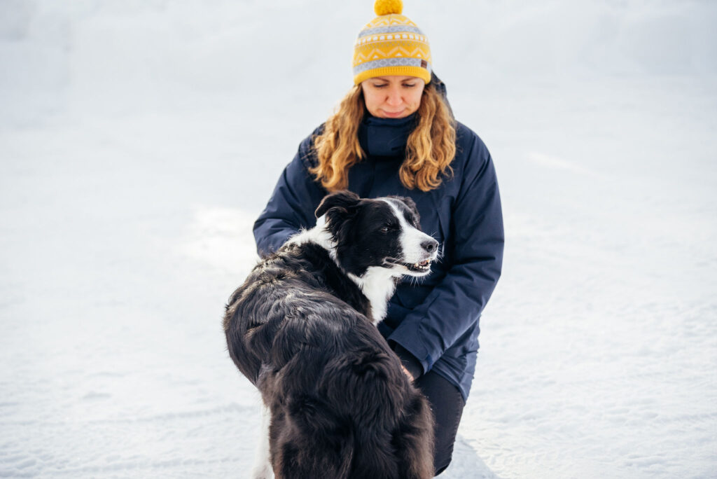 En border collie tillsammans med sin matte